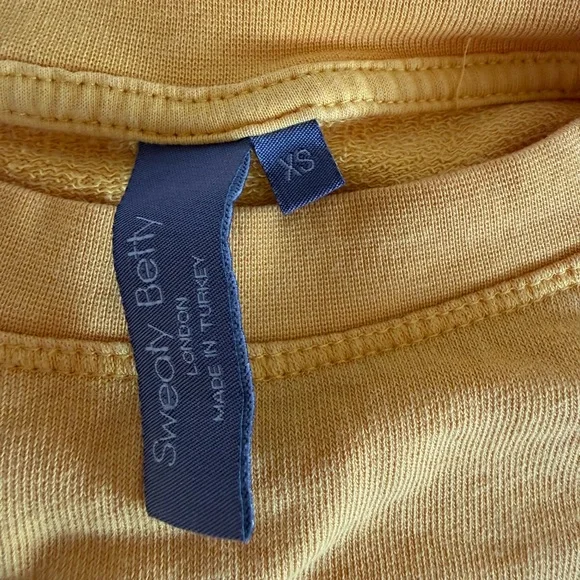 Sweaty Betty Long Sleeve Tee Yellow XS NWOT - Picture 3 of 5